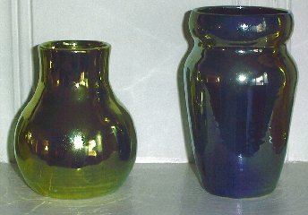 [Iridescent Vessel by Paul J. Katrichs (RLVGLB2 and RLVSLB1 - placed on a Mantel)]